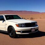 a car in front of a strip club in a desert area