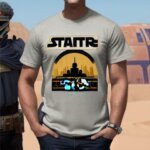Create a design for a 'Tatooine Repair' t-shirt, featuring a workshop or garage for repairing and modifying vehicles in the Star Wars universe. The design should include the text 'Tatooine Repair' prominently displayed, along with imagery that conveys the workshop's function and the Star Wars universe. Use colors and elements that are evocative of the desert planet of Tatooine, and incorporate iconic Star Wars vehicles like the Millennium Falcon or X-wing fighters if possible. The final image should be suitable for printing on a t-shirt and appealing to Star Wars fans.